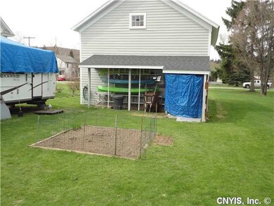 Yard/Garden. Behind garage-room for small garden.