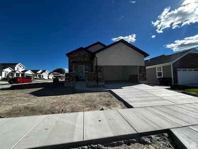 Ranch-style home with brick siding, concrete driveway, a residential view, and a garage