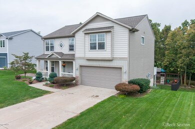 8341 Hawkshead SE unit 66, Byron Center, MI 49315 - photo 2