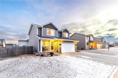 Front of home, gated access to the fenced backyard