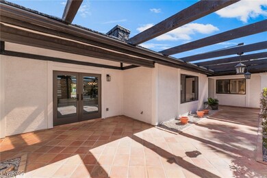 View of patio with a lanai and french doors