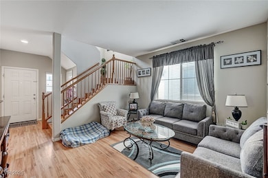 Living area featuring plenty of natural light, sta