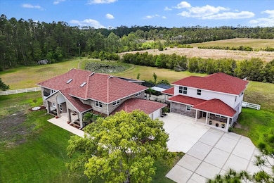 Main home with separate guest house situated on 10 acres