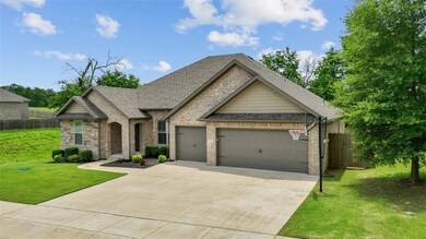 3 car garage with lots of driveway parking
