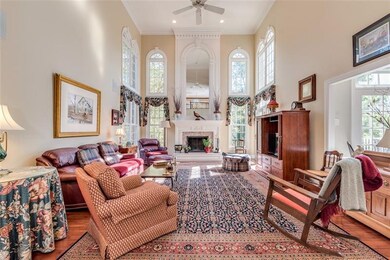 The Dramatic Great Room Features an 18' Ceiling, L