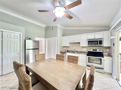 Kitchen featuring stainless steel appliances, crow