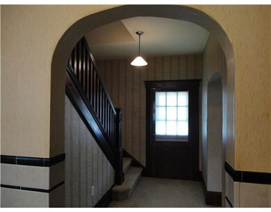 Entry/Foyer. Large foyer has its original woodwork