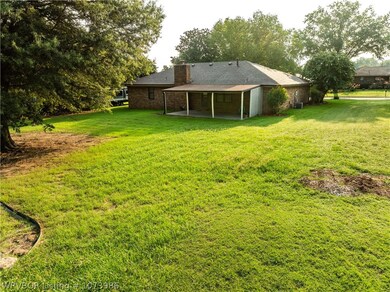 Back yard with covered patio