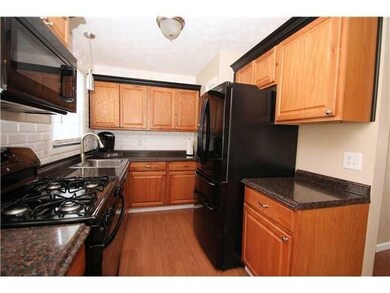 U-shaped kitchen with separate Island and addition