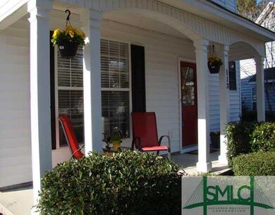 Exterior Front. Rocking chair front porch..