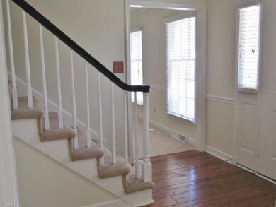 Foyer with wood floors