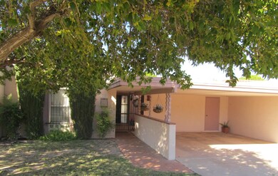 5909 FRONT AND 2 CAR CARPORT