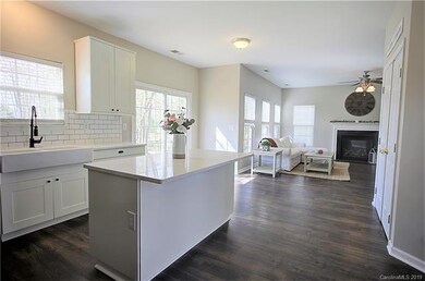 From everyday living to fabulous entertaining, this flowing plan with beautiful neutral updates will not disappoint . New kitchen, flooring and more!