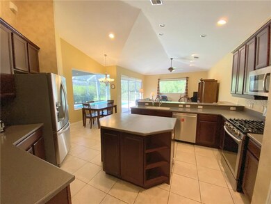 Kitchen, dinette, gathering room.
