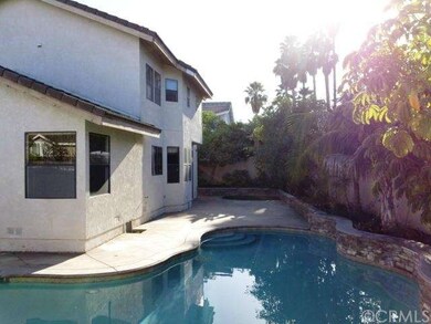 Pool looking at back of home. Notice the rock hard