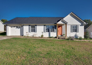 Built in 2000 and with a new roof installed in 2023, this 3-bedroom, 2 bathroom one-level home features painted brick, .23 acre level lot, driveway with parking for 3, 1-car attached garage  and updated landscaping in the front beds.