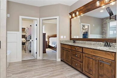 Master suite with separate his and her walk in clo
