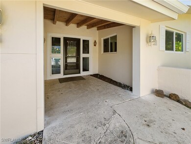Entrance to property featuring a patio
