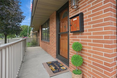 Concrete Front Porch with Vinyl Railing