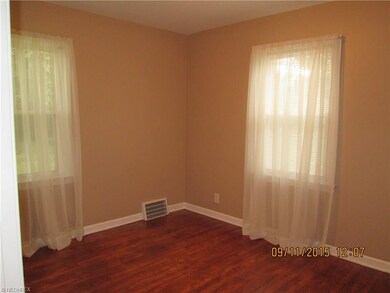 First floor Bedroom with lovely hardwood floors.
