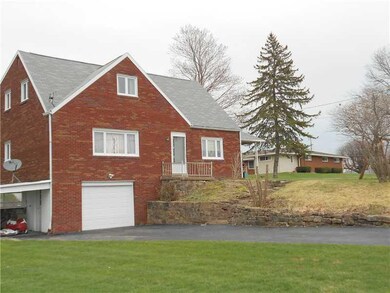 Exterior Front. Brick 4 bedroom home.  Beautiful 1