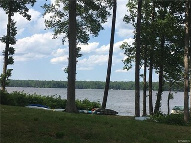 Neighbors keep kayaks at the waterfront.