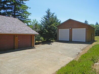 2 car attached & 2 car/RV garage/shop