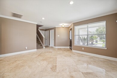 This front room can easily be used as formal living, formal dining, playroom or even designated home office.