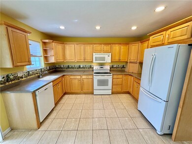Kitchen with upgraded maple cabinets and beautiful