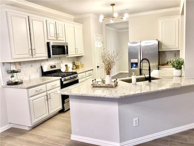 Kitchen featuring stainless steel appliances, a c