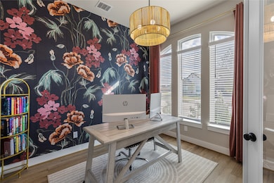 A home office is conveniently located on the first floor.