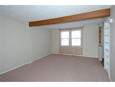 Living Room. Fresh paint and carpet and built-in b