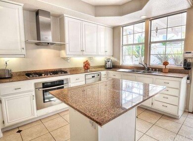 Kitchen island with granite counters, stainless Bo