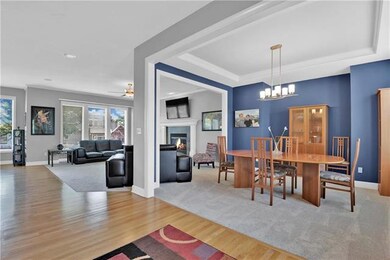 Formal dining space open to great room and kitchen