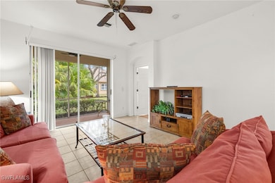 Living room featuring light tile patterned floorin