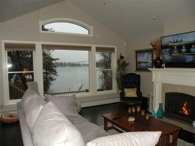 Living Room with propane fireplace and main channe