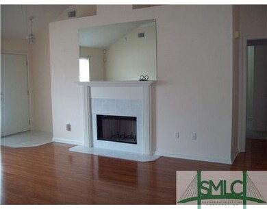 Living Room. Wide Plank Hardwood with Vaulted Ceil
