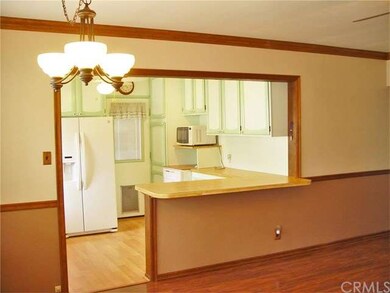 The living room adjoins the kitchen with a breakfa