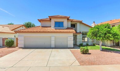 12370 N 54th Dr-large-001-3-Front Exteri
