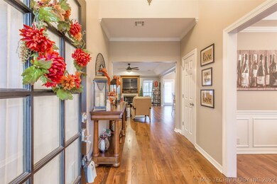 Welcoming entryway with gorgeous wood floors!