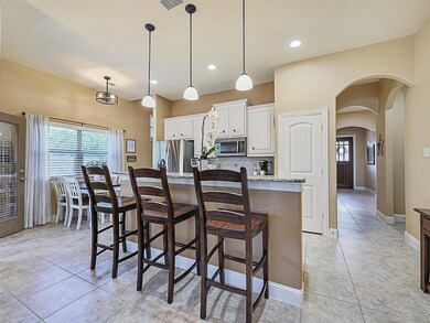Kitchen with appliances with stainless steel finis