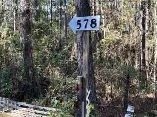 Address at entrance near 3 gates