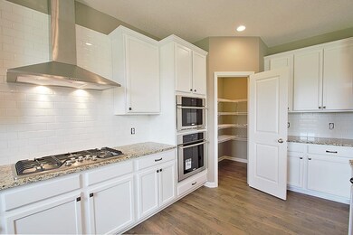 The corner pantry is an added bonus to this dream 