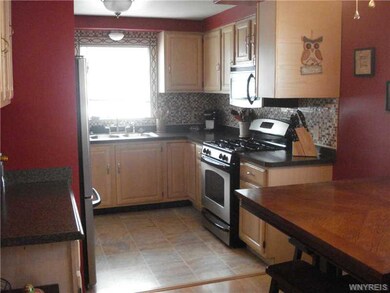 Kitchen. Newer cabinets/floor/ceramic tile