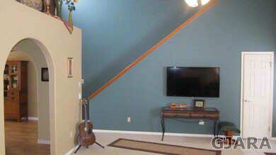 Family Room looking toward formal dining and stair