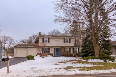 A view from the the road at 57 Squirrels Heath - e
