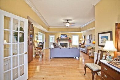 Large open Foyer into the main Living Room and Dining Room.