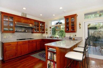 A remodeled and expanded family kitchen with glass