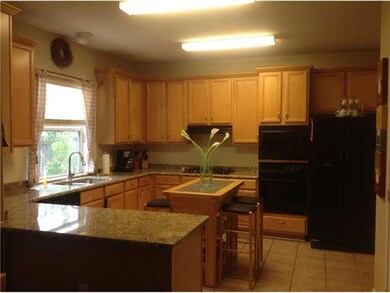 Kitchen. Newly-installed granite countertop, new d