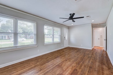 Original hardwoods! Lots of lighting and new ceili